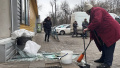 Cleaning up the aftermath of the attack. Photo: Suspilne