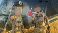Ukrainian soldiers in front of a Russian Mi-8 helicopter. Photo: Artem Shevchenko