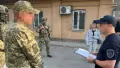 Затримання підозрюваних. Фото: ДБР