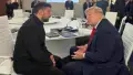 Зеленський заявив, що зустрівся з Трампом і оприлюднив спільні фото