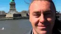 Игорь Мирошниченко на фоне статуи Свободы. Фото: facebook/igor.mirosnicenko.138840